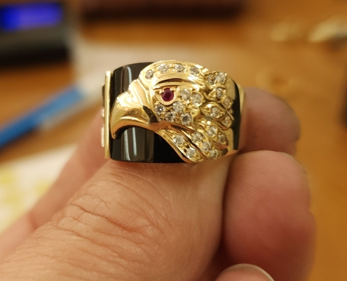 Men's ring 14k yellow gold with onyx eagle motif Bootie's Pawn Shop