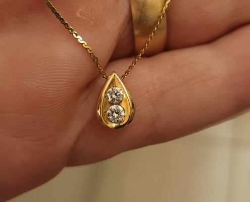 14k gold and diamond pendant Bootie's Pawn Shop