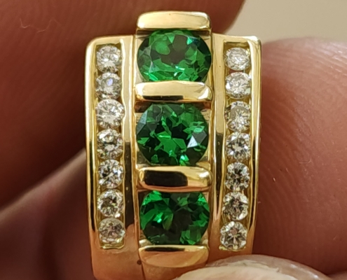 Emerald and diamond earrings in 14 karat gold Bootie's Pawn Shop